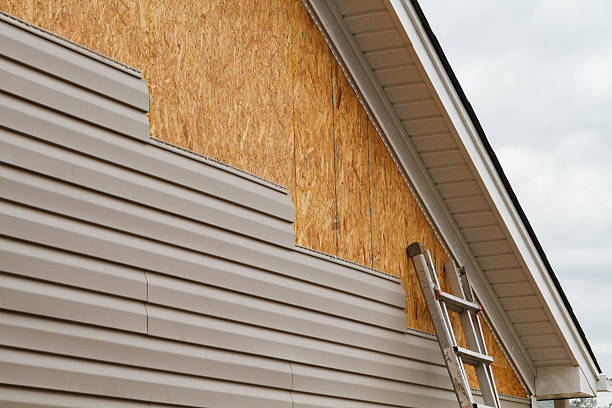 Professional Siding technician working in Church Road, VA